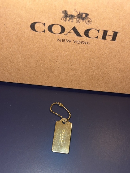 Coach Accessories - Coach mini Gold hang tag